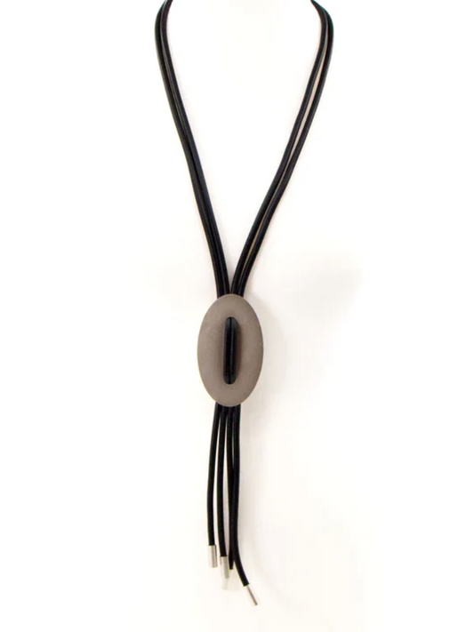 Long neoprene oval necklace with Y-shape design and oval feature.