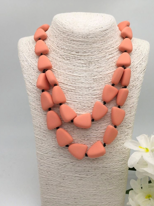 Short Pebbles Necklace with adjustable gold metal fastening and faux double strand effect.