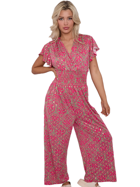 Tie back stretch jumpsuit with v-neck and pockets.