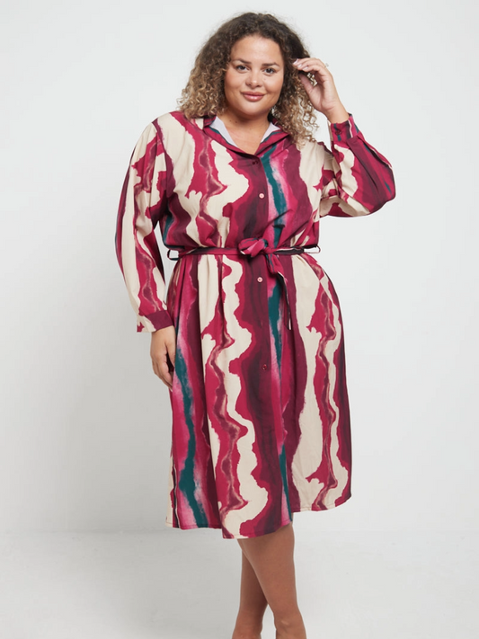 Wave Shirt Dress in vibrant wave print with button-down front and tie waist.