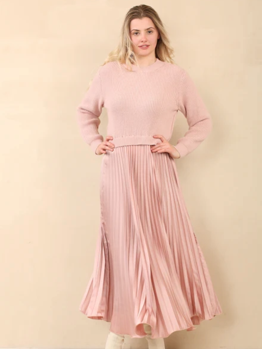 Pleated jumper dress with a satin-look pleated skirt in a stylish pink color.