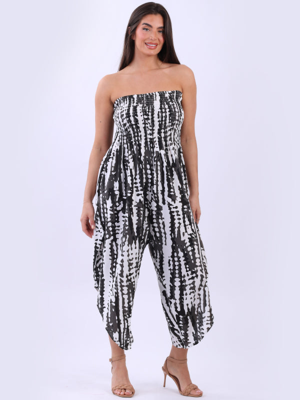 Tie dye bandeau jumpsuit with smocked yoke and wide legs.
