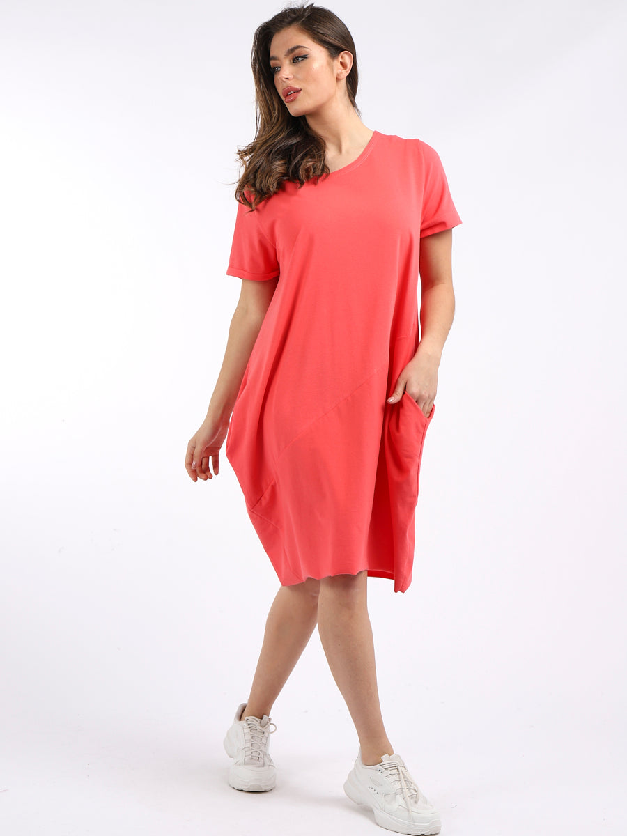 Ladies plain cotton cocoon dress with round neck, short sleeves, in coral color.