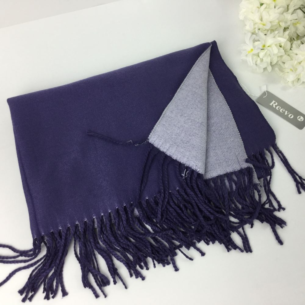 Plain soft winter scarf made of 60% viscose and 40% polyester with fringe detail.