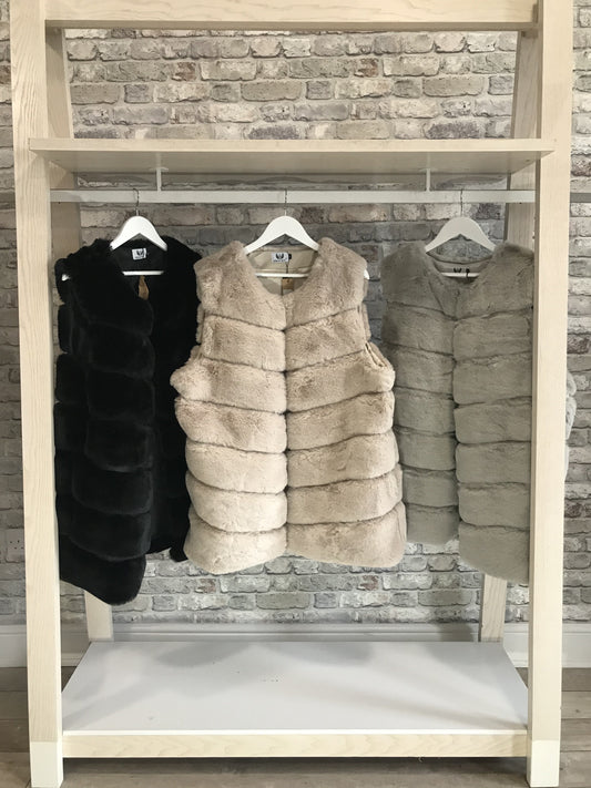 Ladies Faux Fur Gilet with silk lining and pockets in various colors.